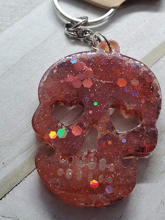 Pink holographic glitter skull keychain