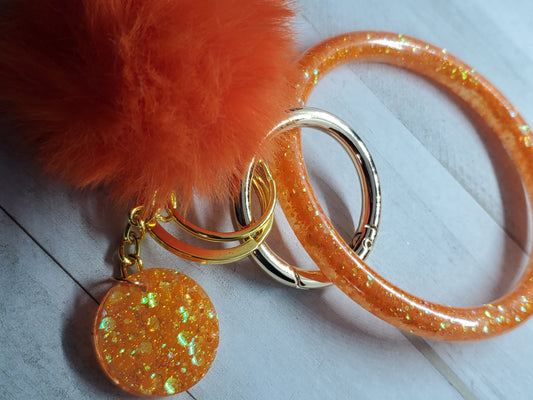 Orange bangle wristlet keychain