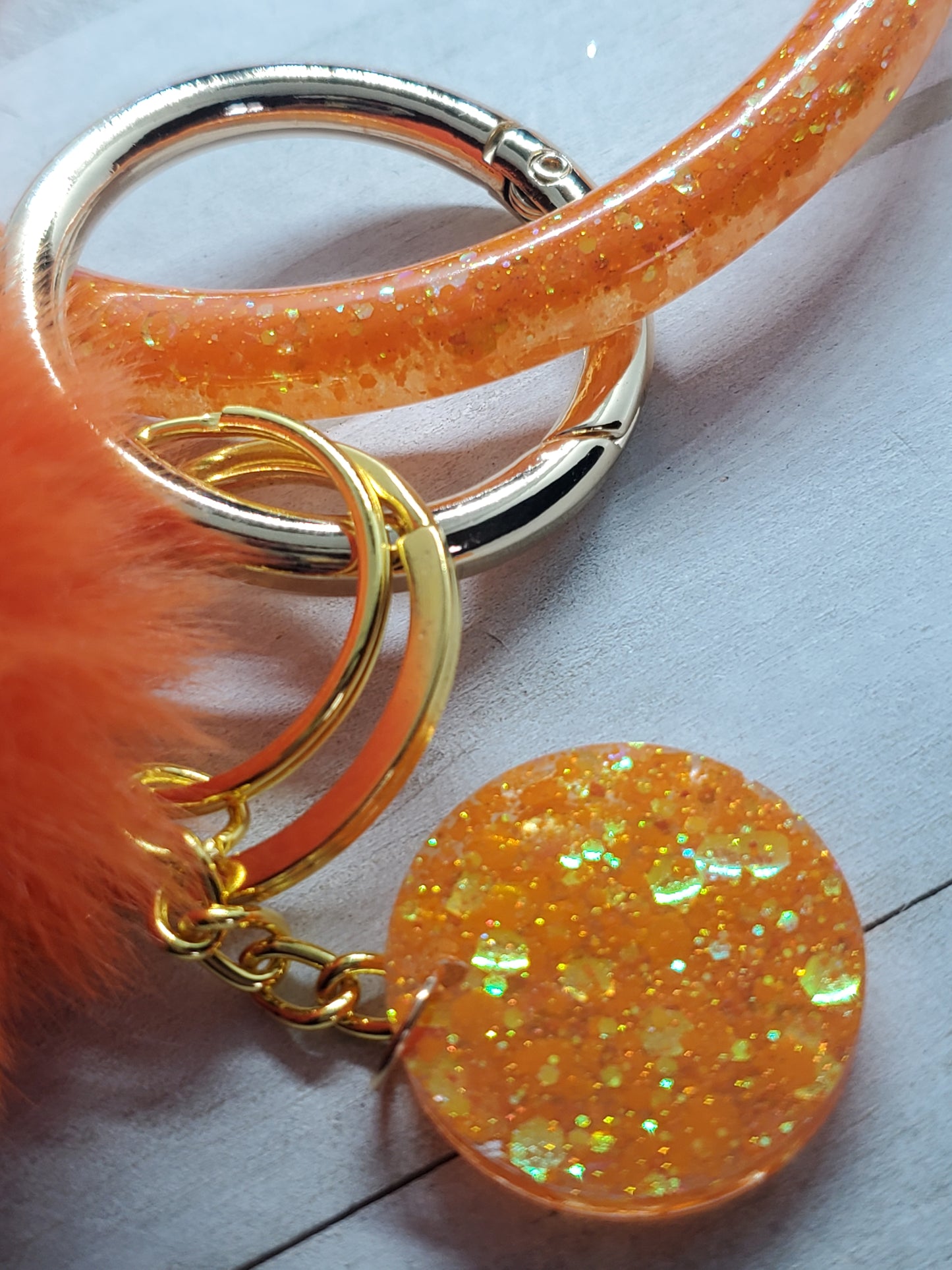 Orange bangle wristlet keychain