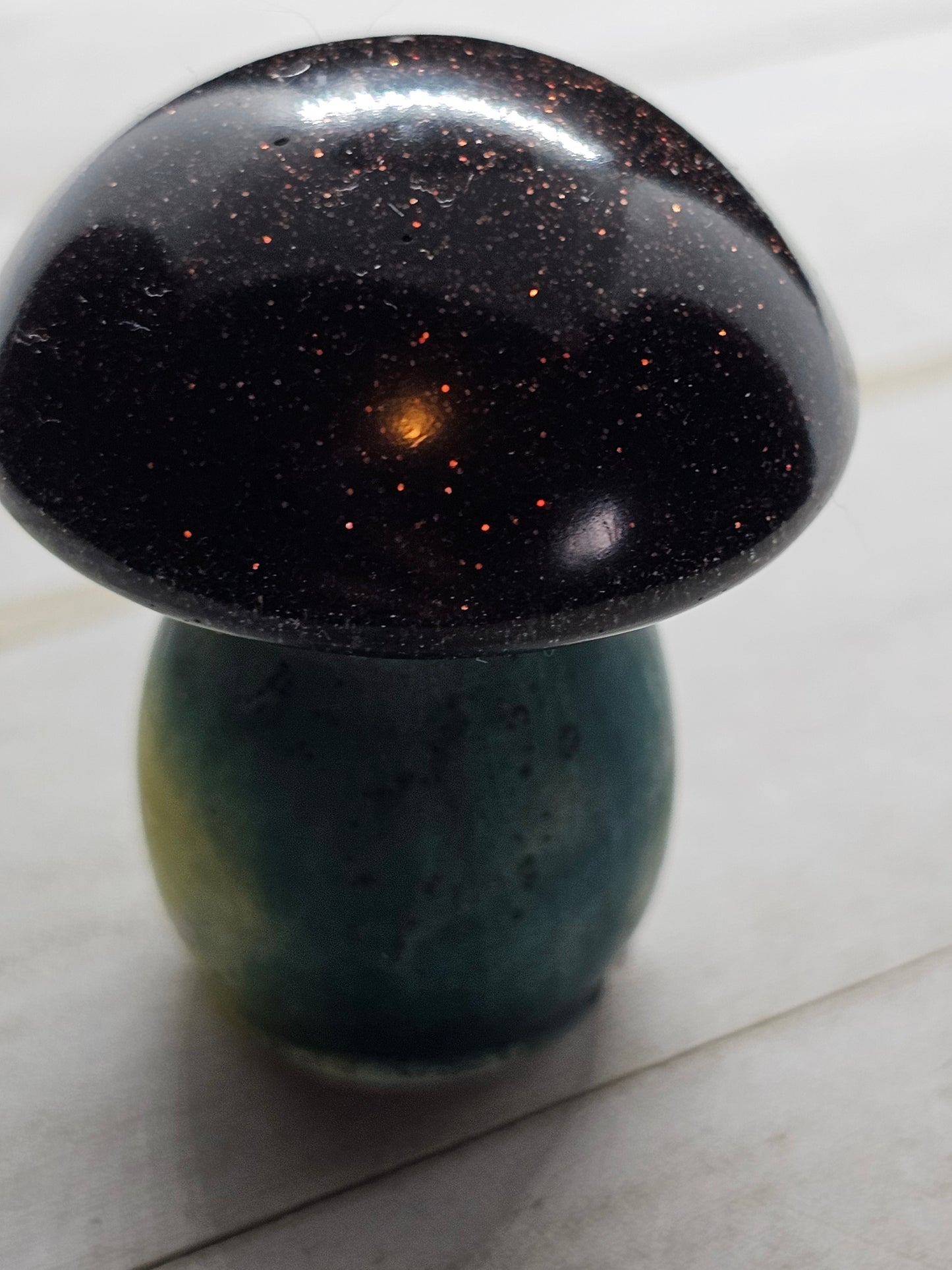 green and black resin mushroom