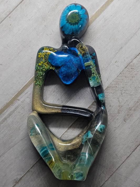 thinker flower figure
