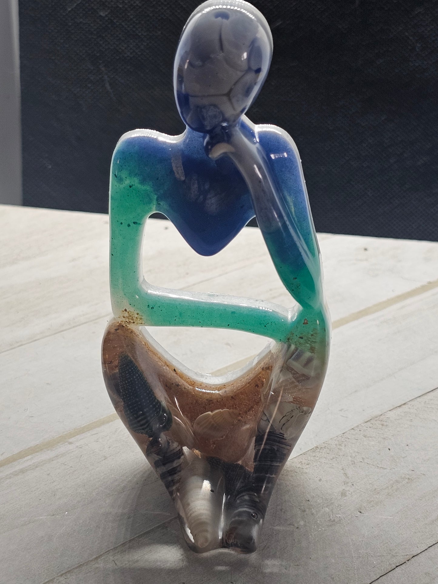 Beach thinker resin figurine