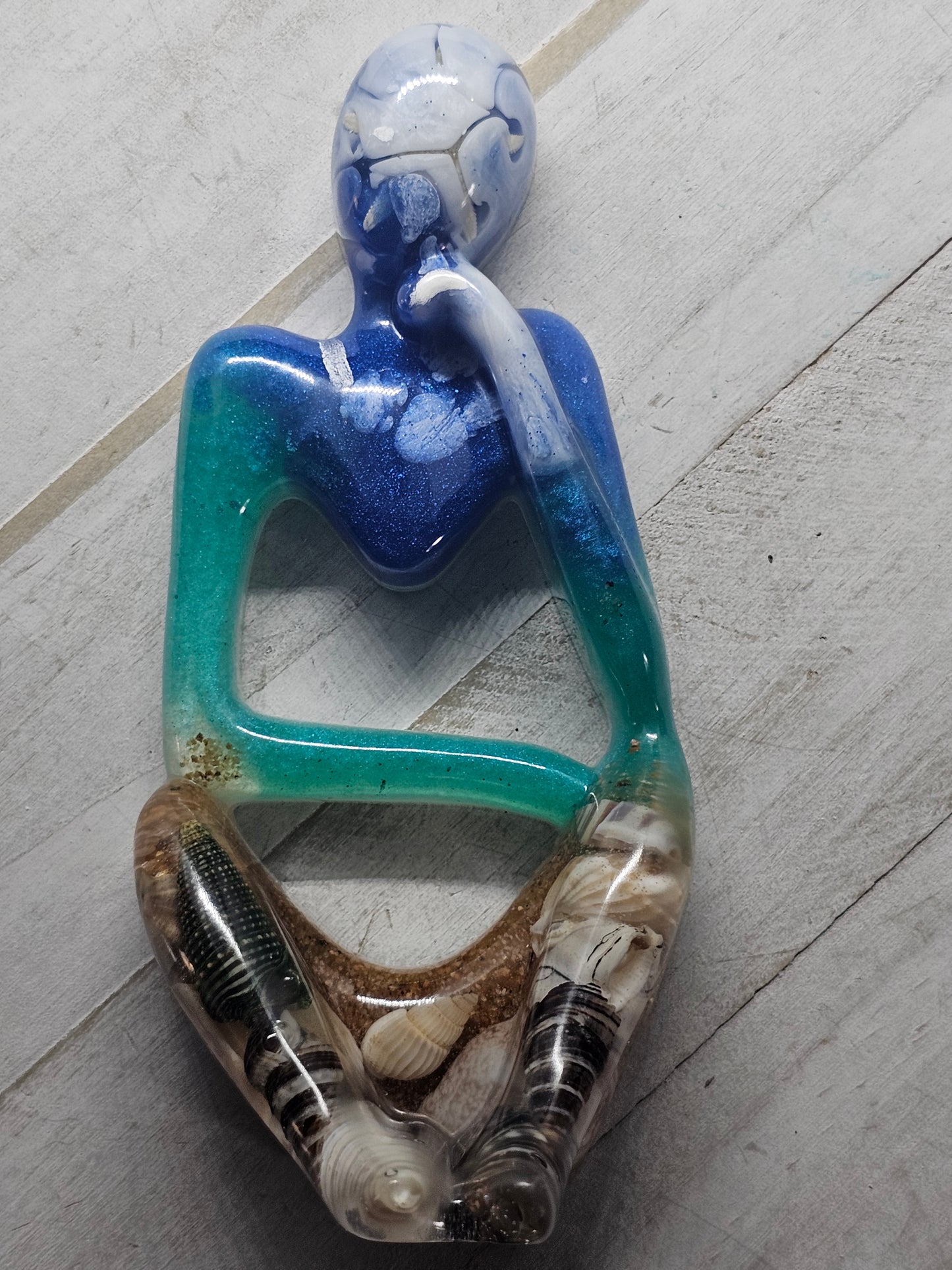 Beach thinker resin figurine