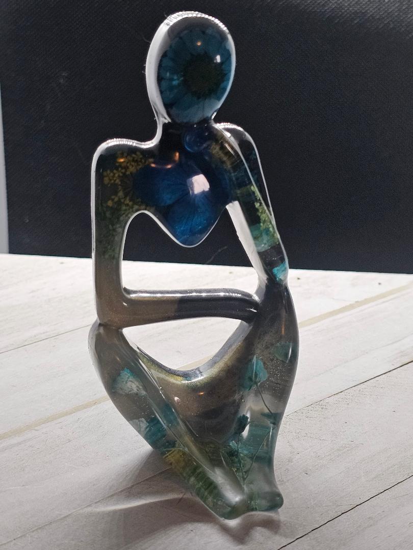 thinker flower figure
