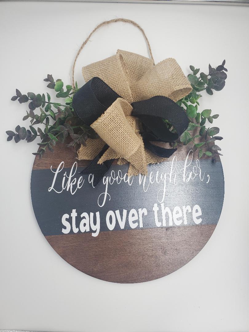 Like a good neighbor, stay over there door hanger