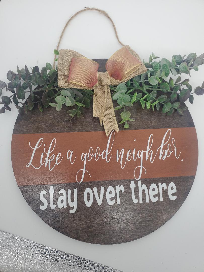 Like a good neighbor, stay over there door hanger