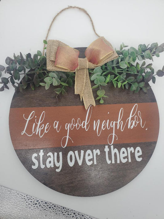Like a good neighbor, stay over there door hanger